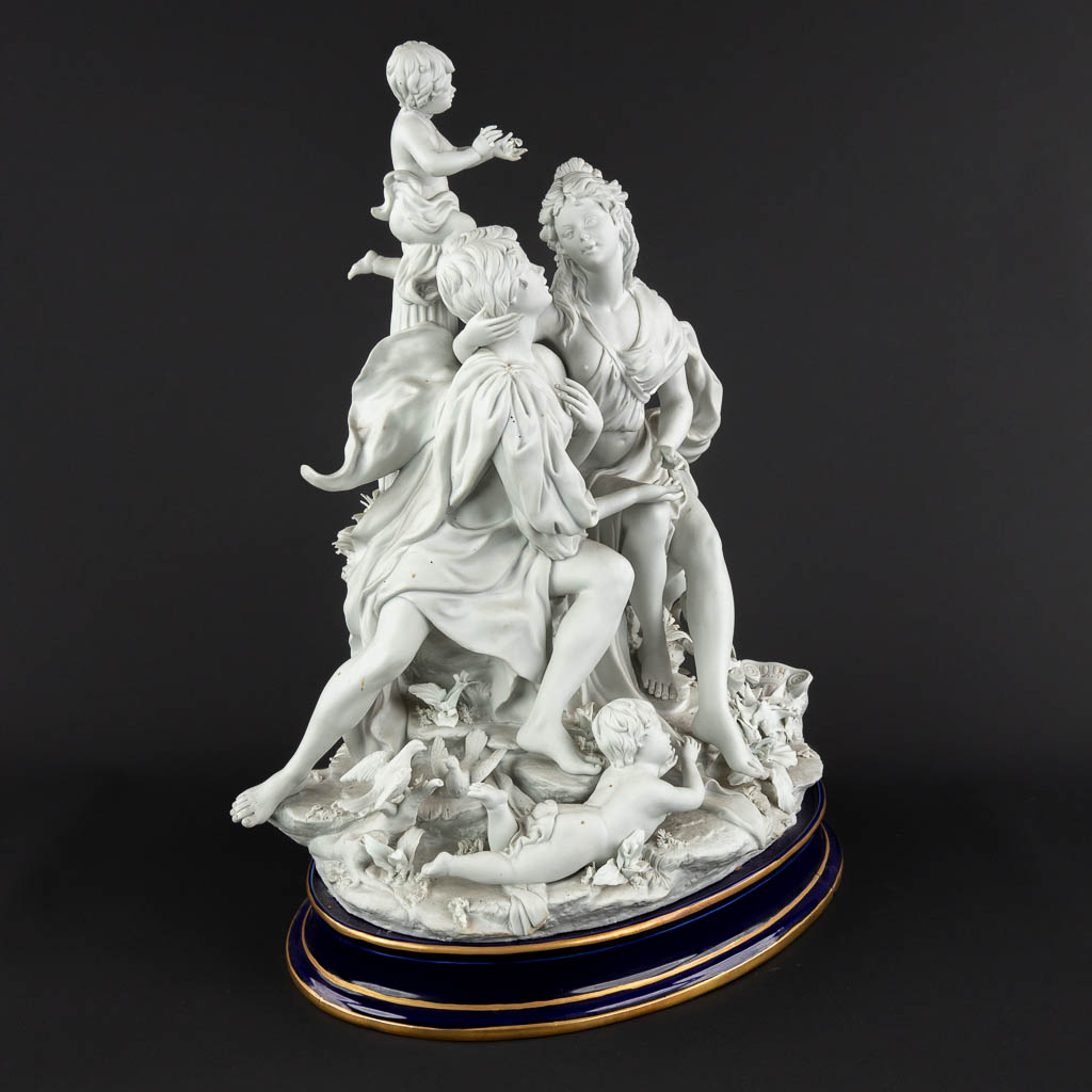 A large group, bisque porcelain with a romantic scène. 20th C. (D:26 x W:36 x H:47 cm)