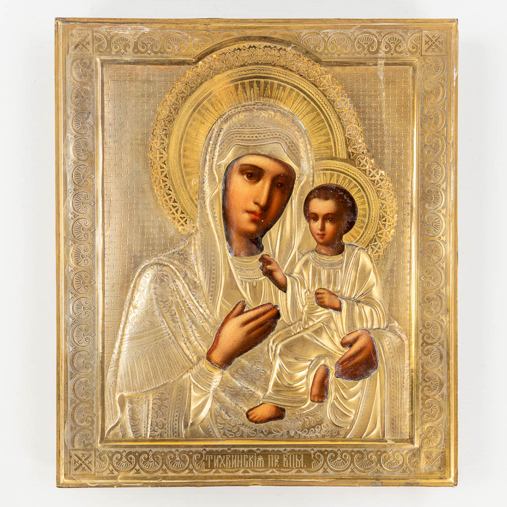 An antique Icon, an Image of Madonna with a child, silver overlay. Saint Petersburg, 19th C. (W: 40,5 x H: 45 cm)