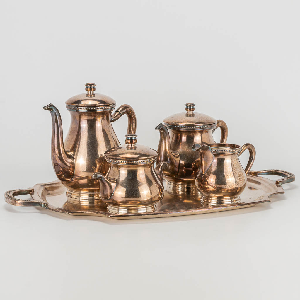 A coffee and tea service made of silver-plated metal and marked Wiskemann 