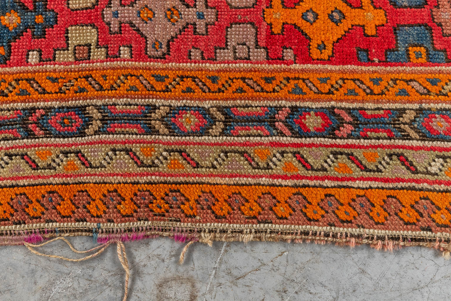 An Oriental hand-made carpet, Karabach (D:290 x W:128 cm)