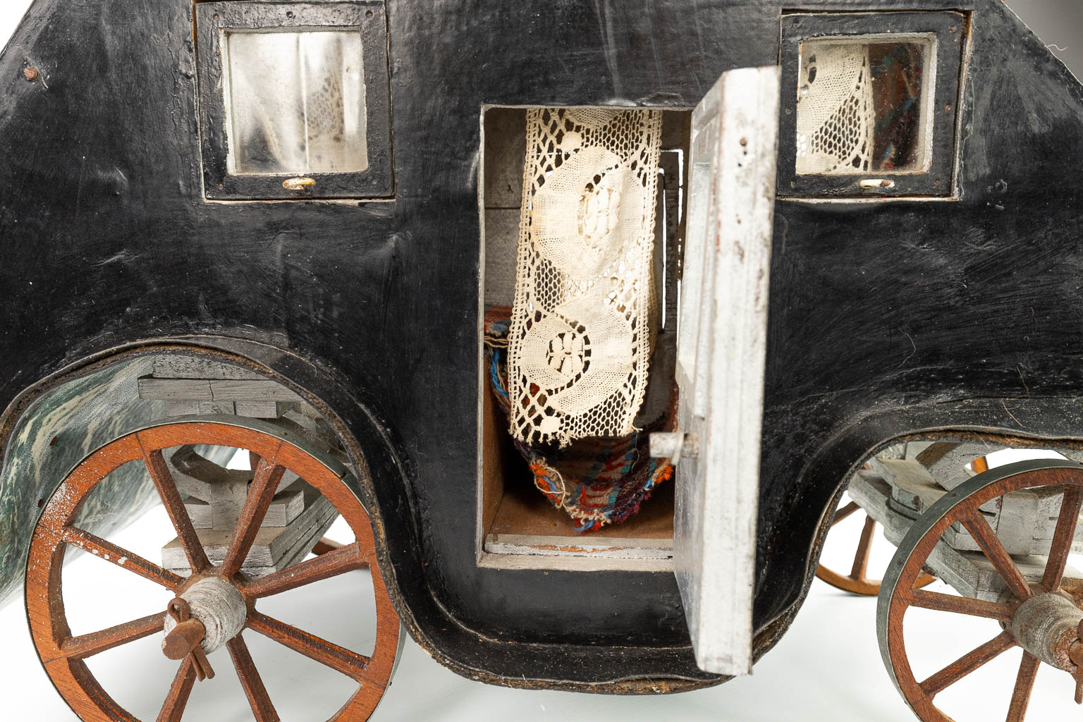 A miniature horse drawn carriage, made of wood. (H:39cm)