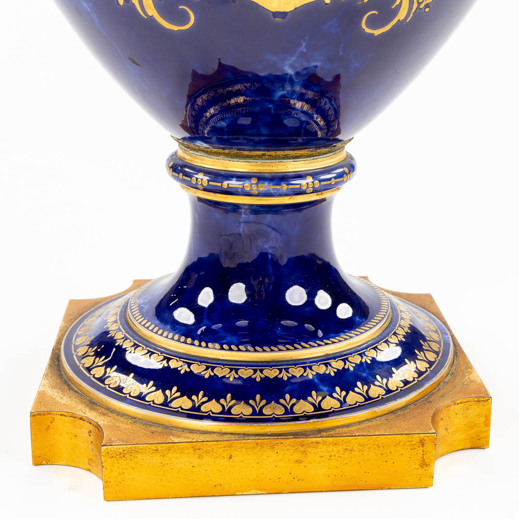 Sèvres, an exceptionally large vase with a hand-painted decor, France, 1867. (L:37 x W:52 x H:76 cm)