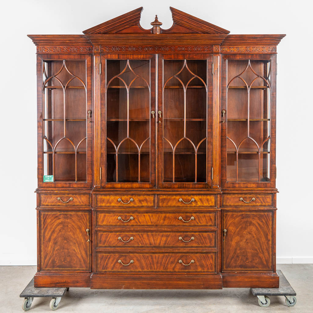 A display cabinet made by Jonathan Charles in the UK. 20th century. (H:239cm)