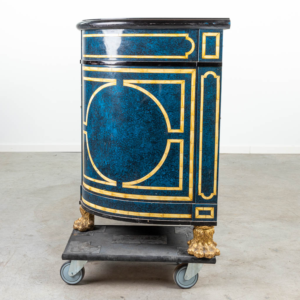 A sideboard with faux Lapis Lazuli and inlaid bone in Hollywood Regency style, standing on bronze claw feet. (H:90cm)