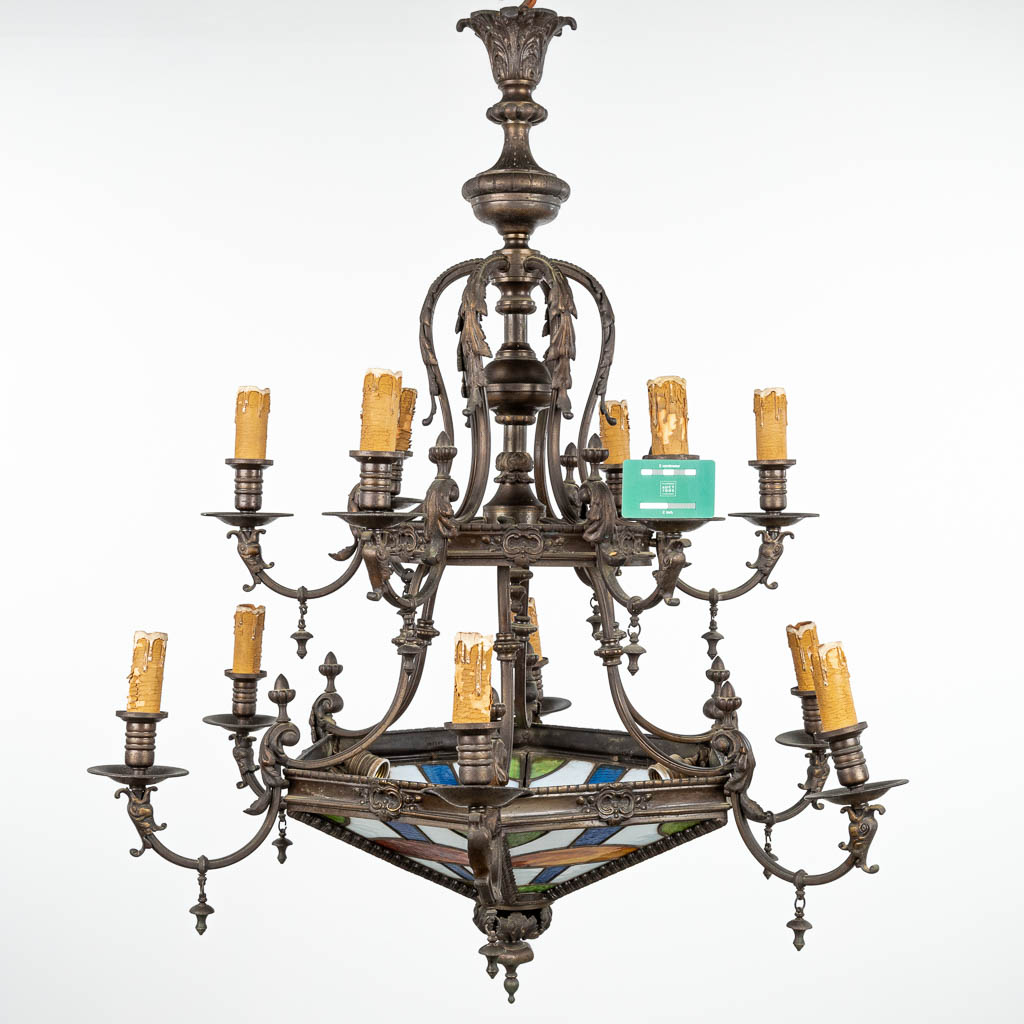 A large double chandelier made of bronze and finished with stained glass. (H:105cm)