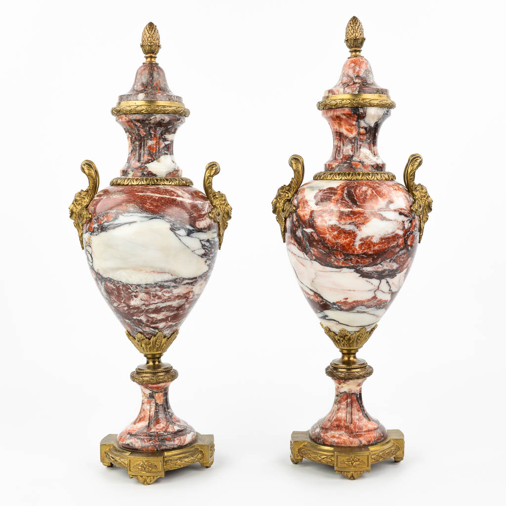 A pair of cassolettes made of red marble mounted with gilt bronze in Louis XVI style. (H:51cm)