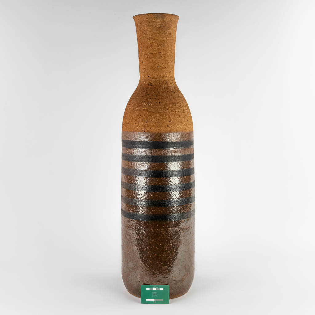An exceptionally large, partially glazed ceramic vase. Circa 1960. (H:85,5 x D:24 cm)