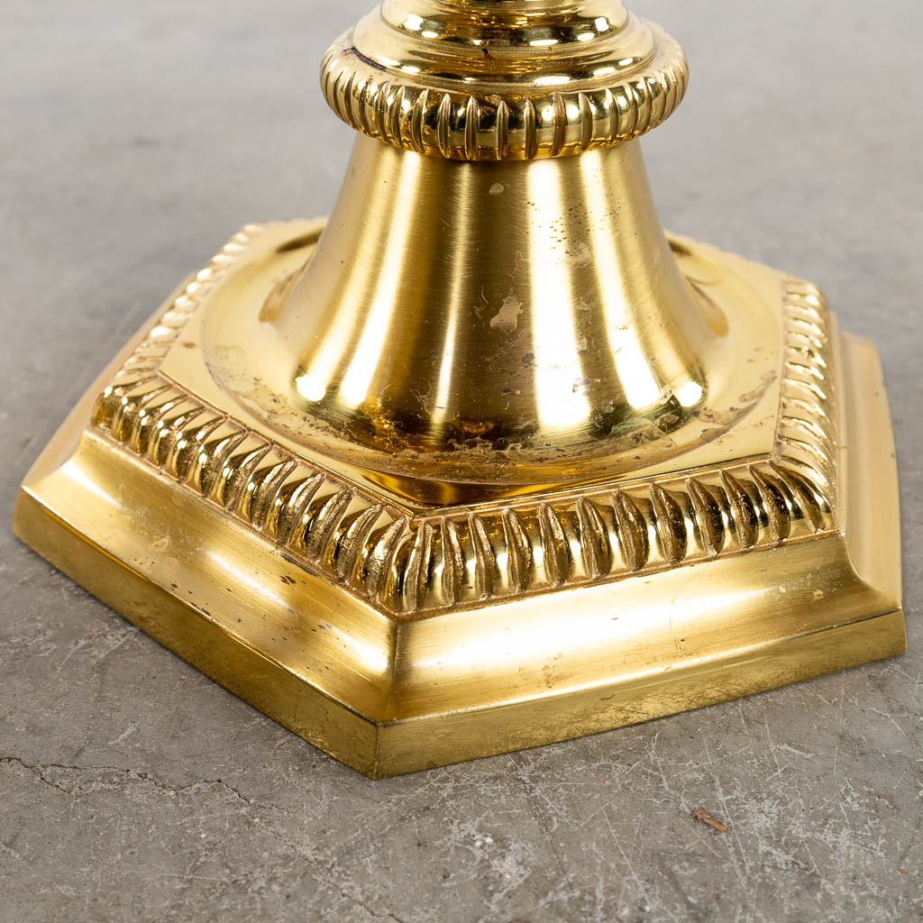 Twelve Church candlesticks. Gold-plated brass, 20th C. (H:53 x D:23 cm)
