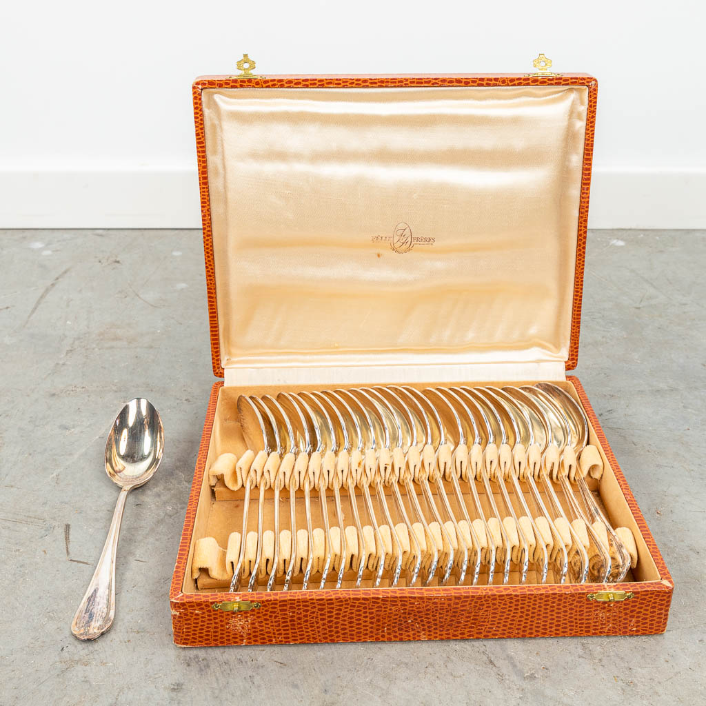 A 24-piece silver-plated cutlery in multiple boxes and marked Felix Frères. 