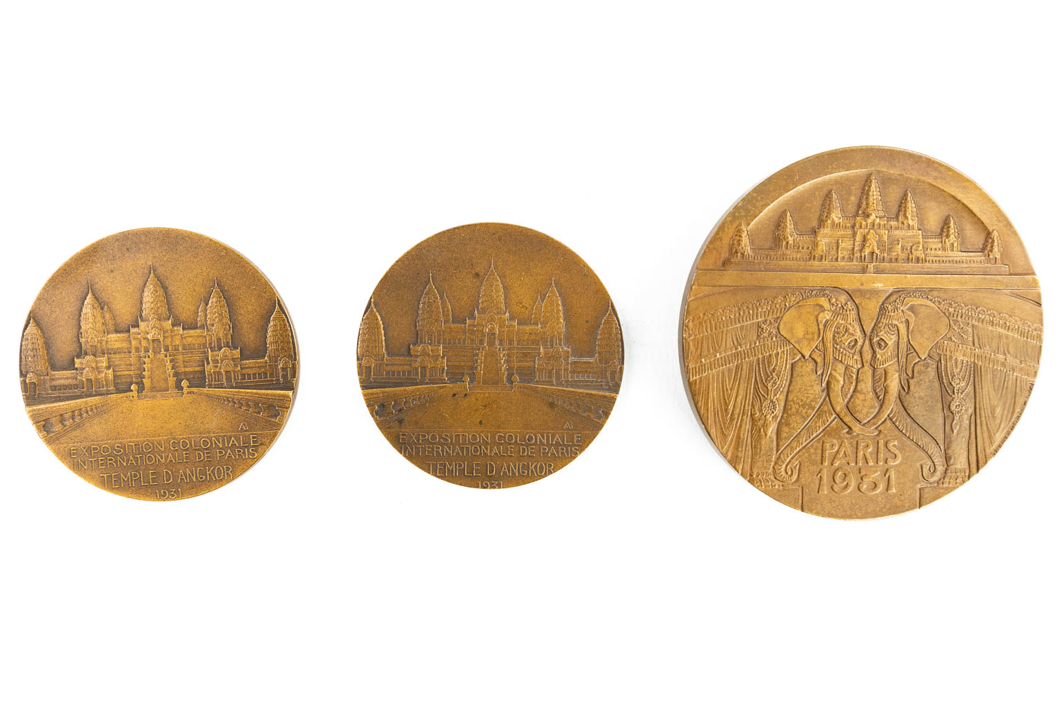 A collection of 12 medals of the world expo. 