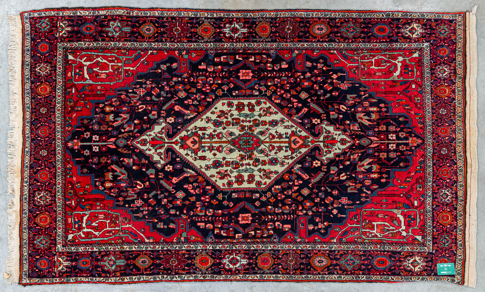 An Oriental hand-made carpet Bidjar. (135 x 219 cm)
