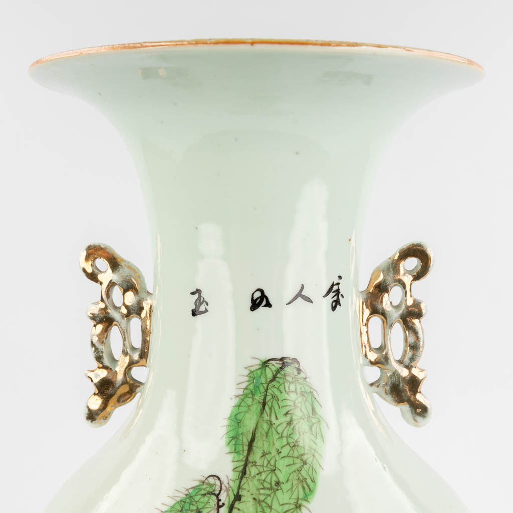 A Chinese vase, porcelain decorated with ladies and playing children. 19th/20th C. (H: 57 x D: 24 cm)
