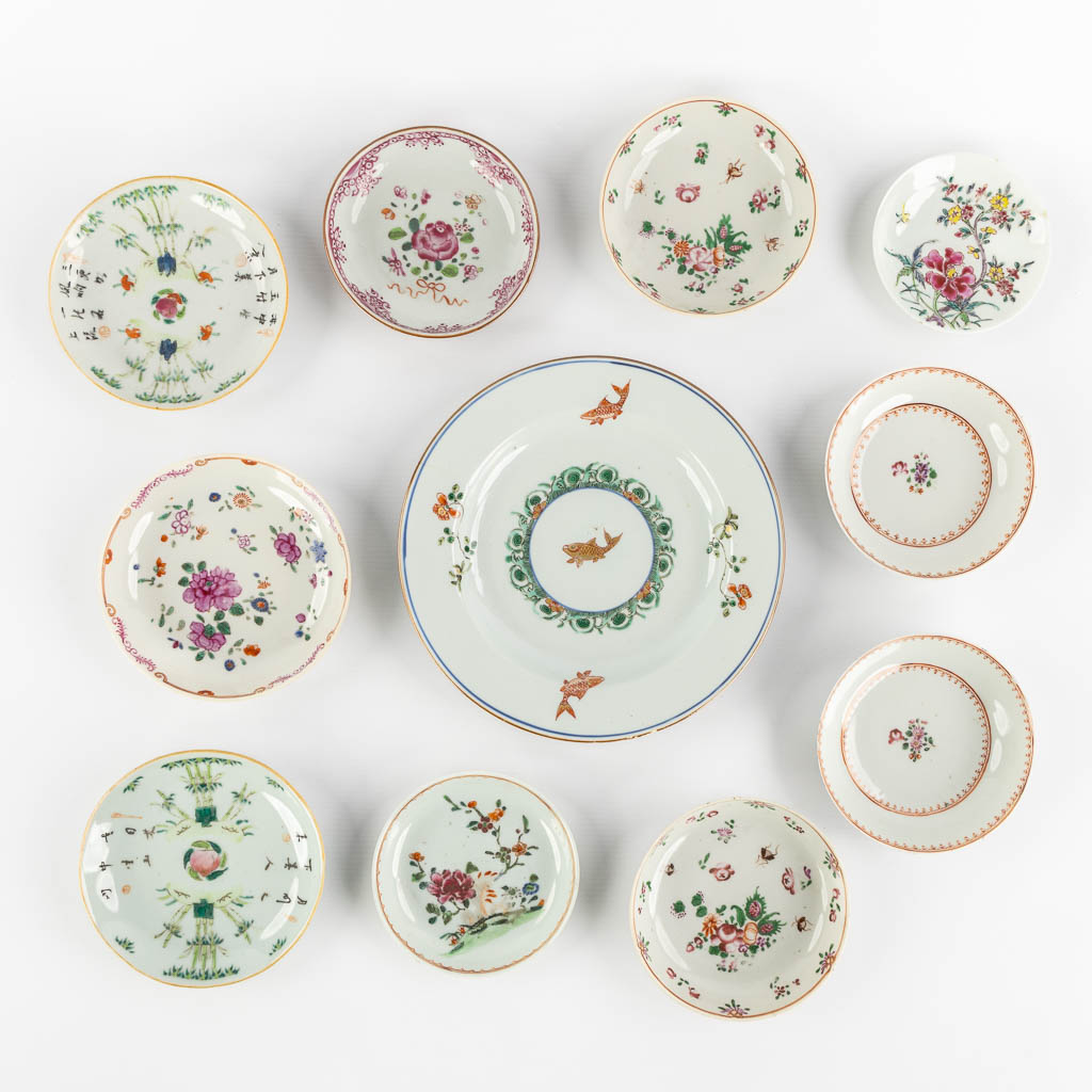 Lot 004 Ten Chinese Famille Rose plates, Carp and flowers. Kangxi or later. (D:22 cm)