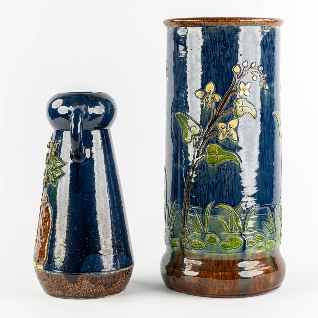 Flemish Earthenware, an umbrella stand and vase. (H:57 x D:27 cm)