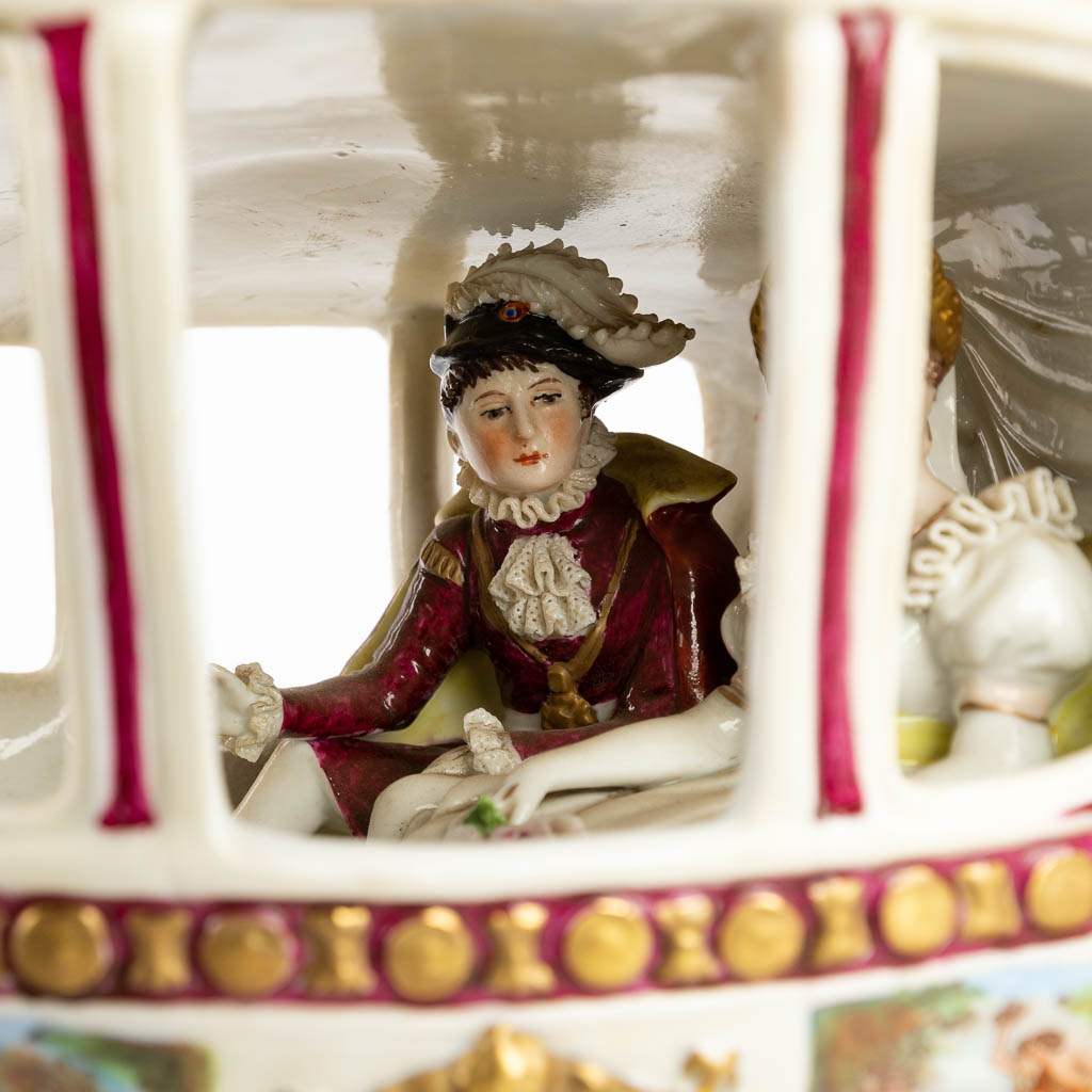 Sitzendorf, a large horse-drawn Marriage carriage of Napoleon the 1st. Polychrome porcelain. 20th C. (D:20 x W:67 x H:30 cm)