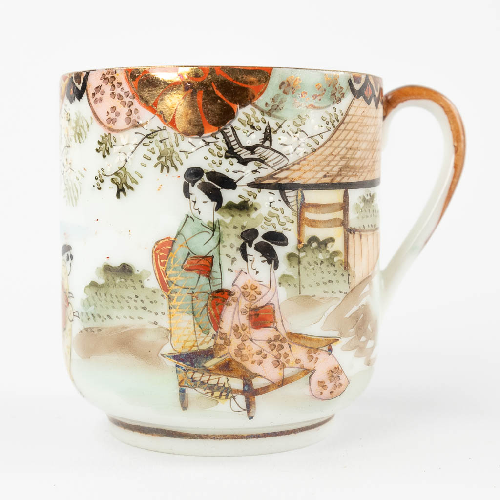 A Japanese Satsuma tea service, polychrome porcelain in a storage box. 20th C. (D:46 x W:57 x H:16 cm)