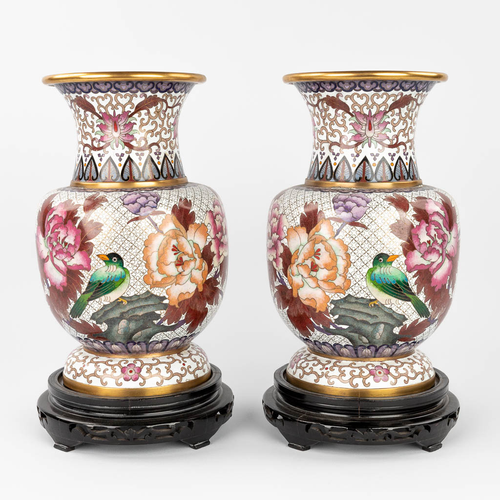  A pair of cloisonné vases with flower and bird decor, in the original box. 