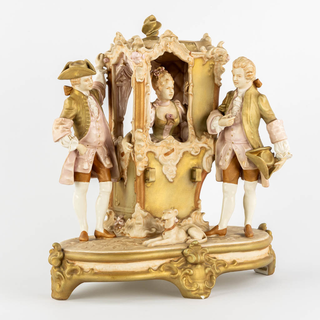 Royal Dux, a 'Sedan Chair', polychrome porcelain. (L:23 x W:37 x H:40 cm)