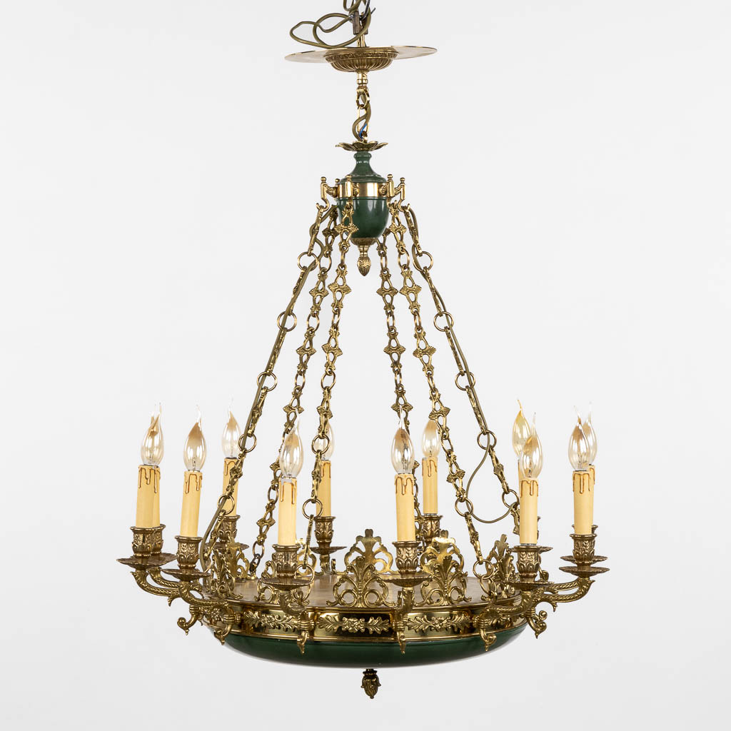 A chandelier, brass in Empire style. Circa 1970. (H:104 x D:73 cm)