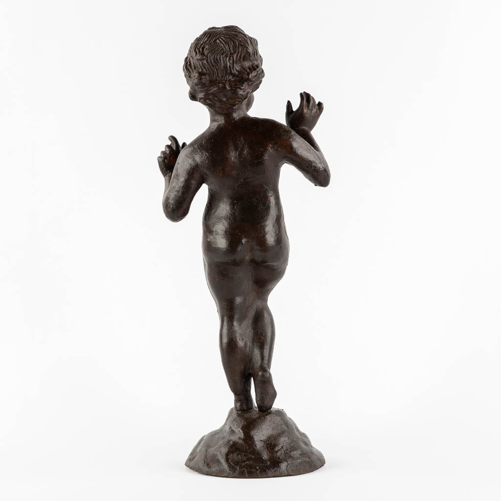 Figurine of a boy, cast-iron. (W:17 x H:53 cm)