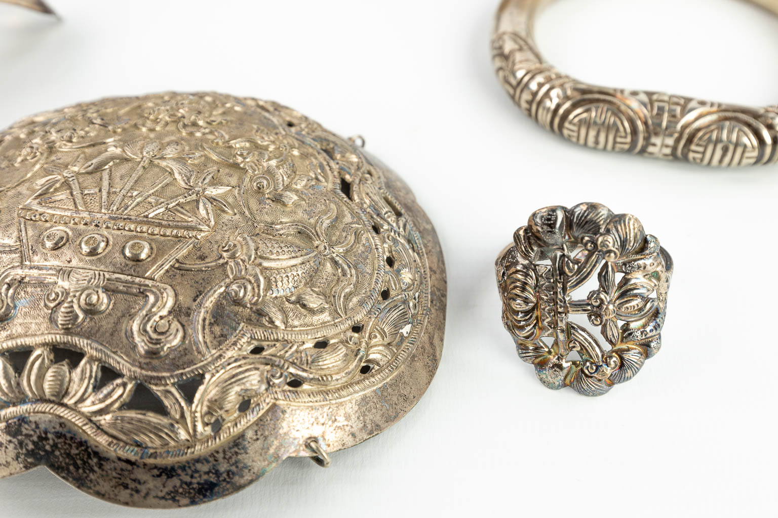 A collection of silver and silver-plated jewellery in 2 boxes decorated with butterflies. (H:8cm)