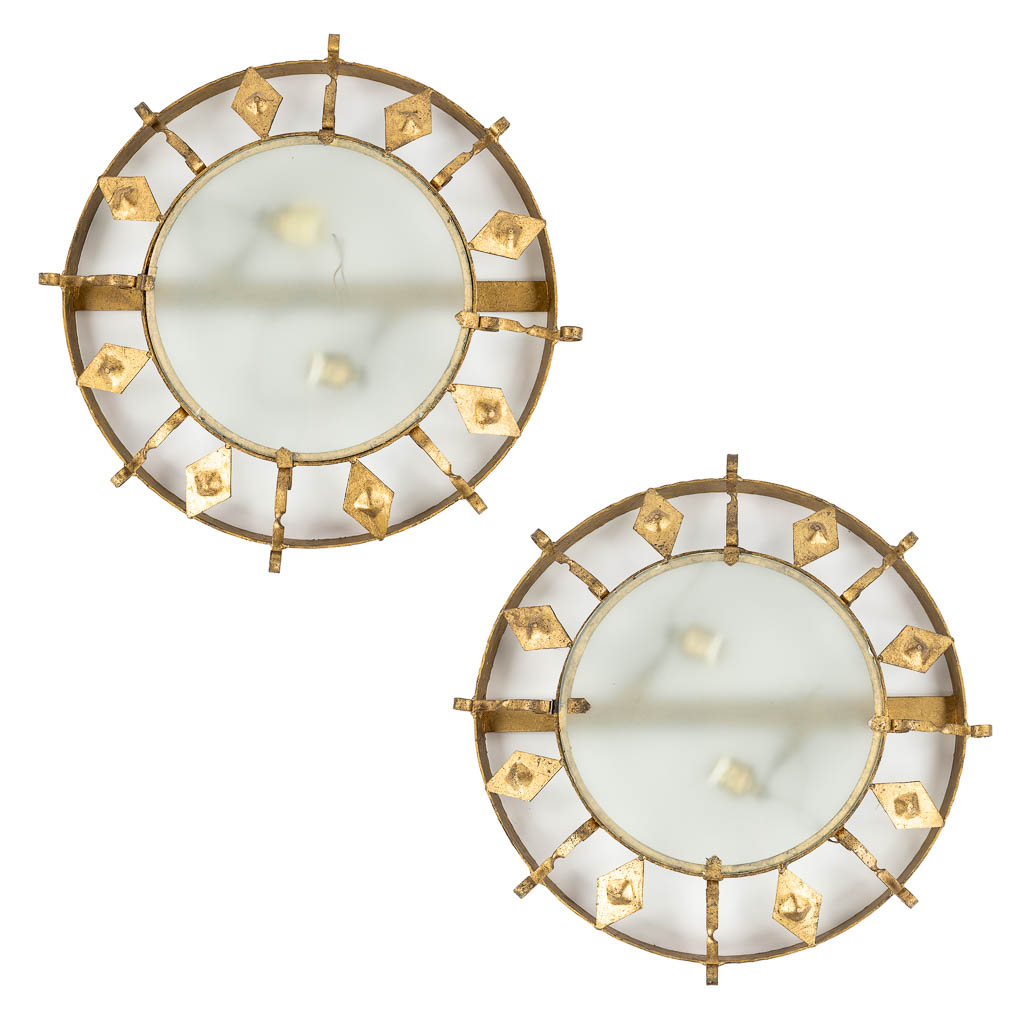 A pair of ceiling lamps made of gold-plated metal and opaline glass. (50cm)