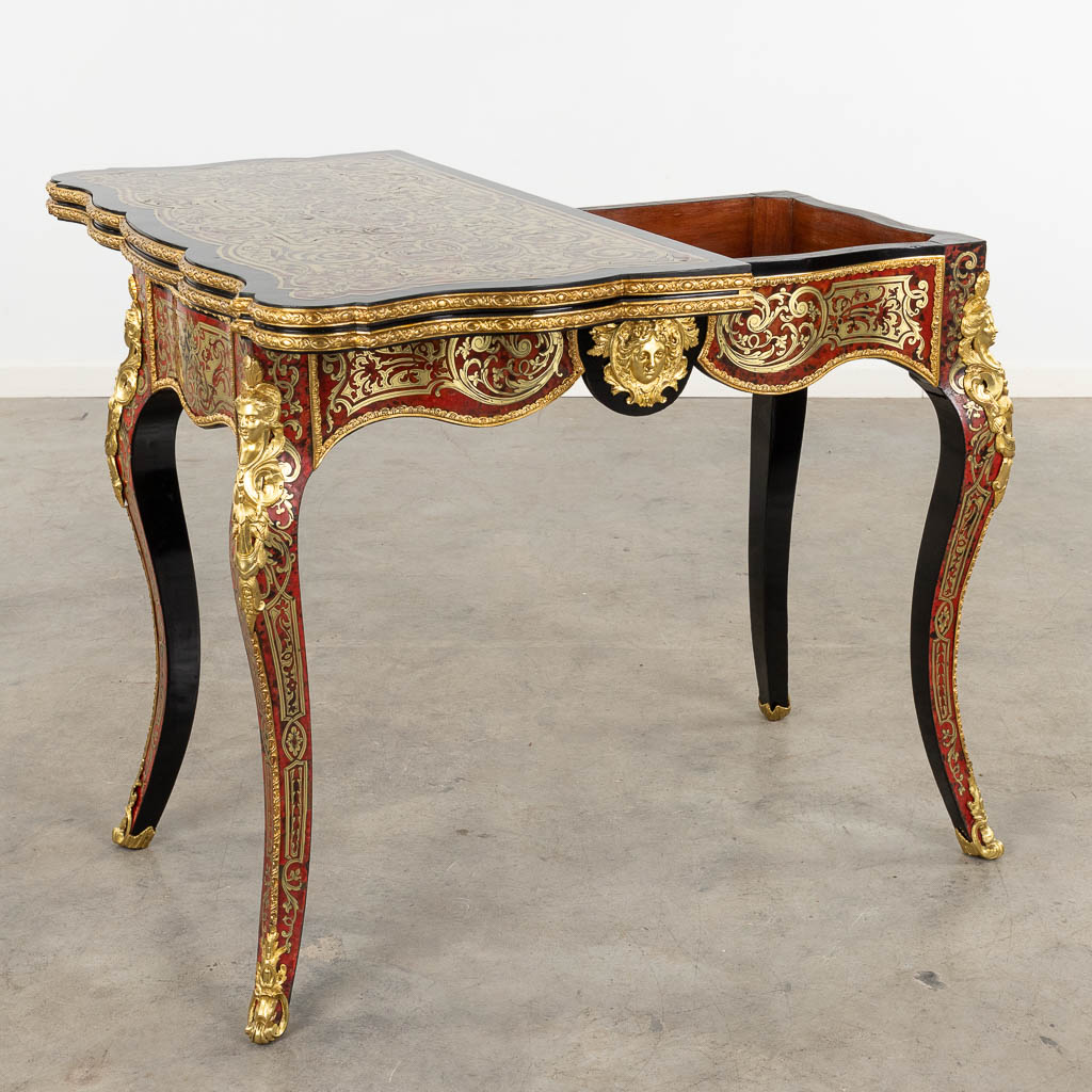 A game table, Boulle, tortoiseshell and copper inlay, Napoleon 3, 19th C. (D:52 x W:91 x H:76 cm)