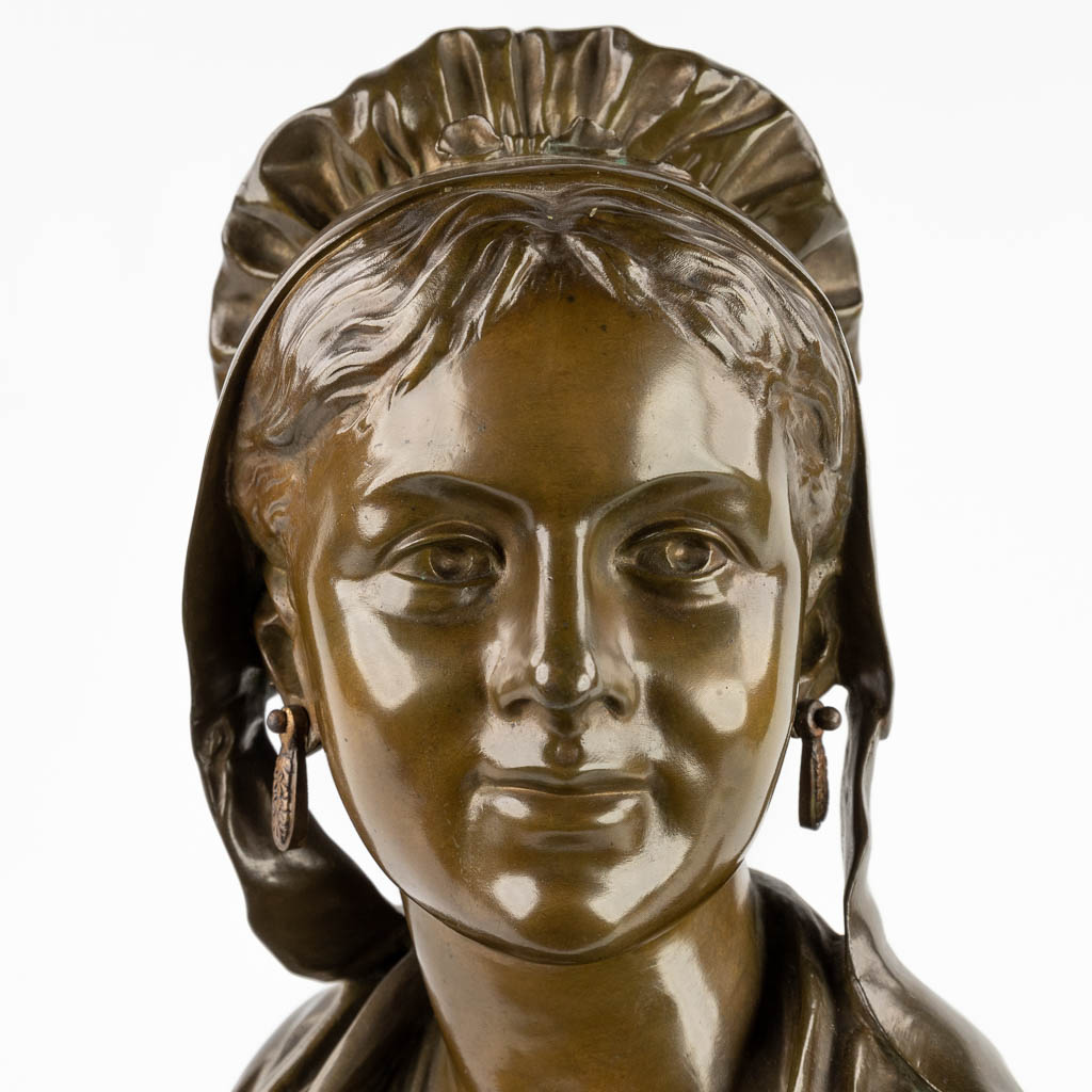 Bust of a lady, patinated bronze, signed 