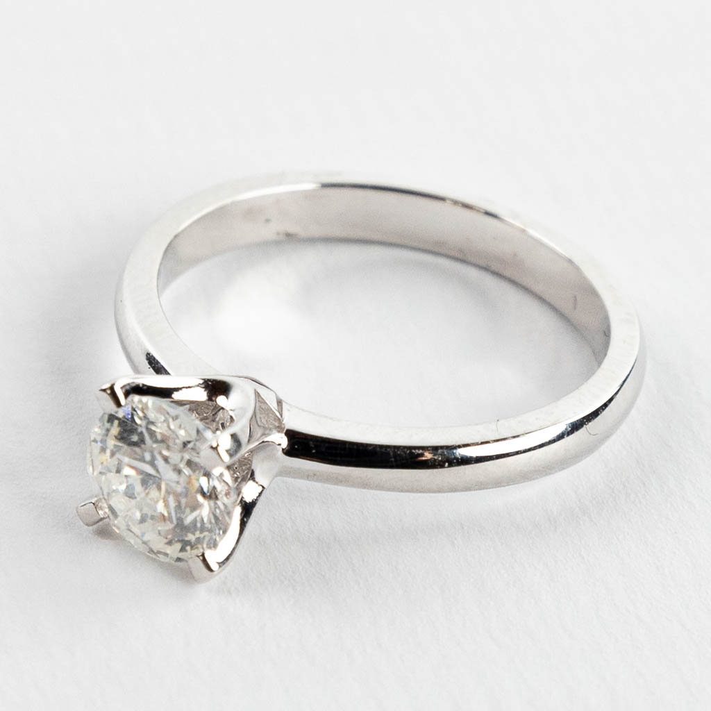 An engagement ring with a solitaire stone in a white gold ring. 1.01 carats. 