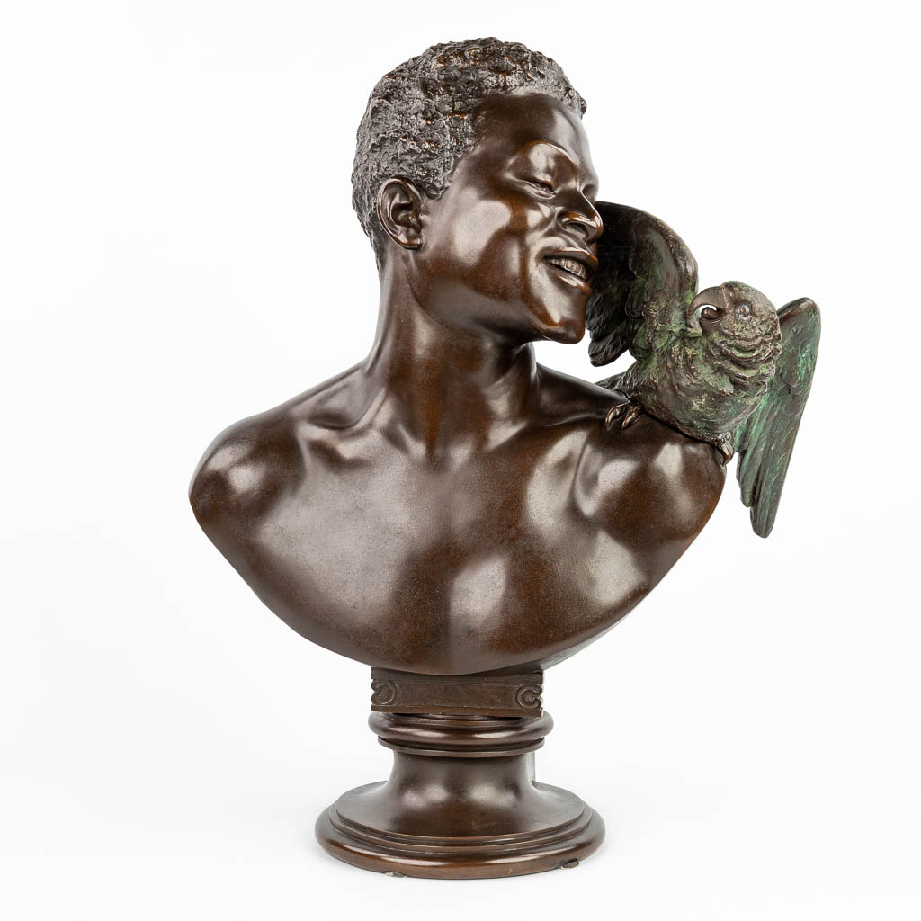 Oskar GLADENBECK (1850-1921) 'Bust of African man with Parrot', made of spelter. (H:64cm)