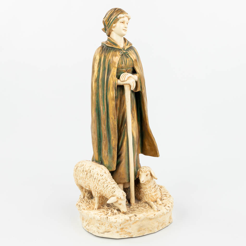 A statue of a sheepherder made of faience in art deco style and made by Bernard Bloch. (H:46cm)