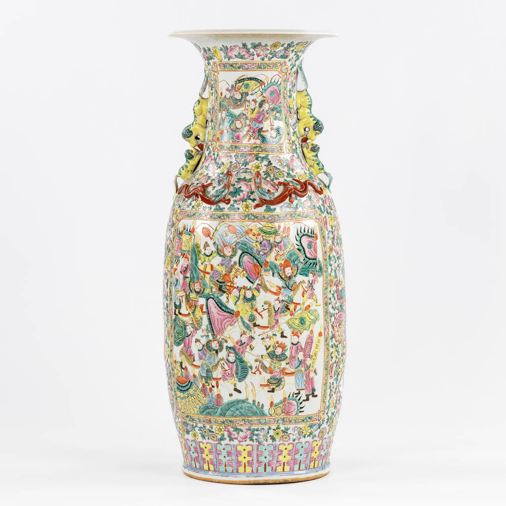 Lot 012 A very large Chinese Famille Rose vase, decorated with figurines (crack). (H:91 x D:38 cm)