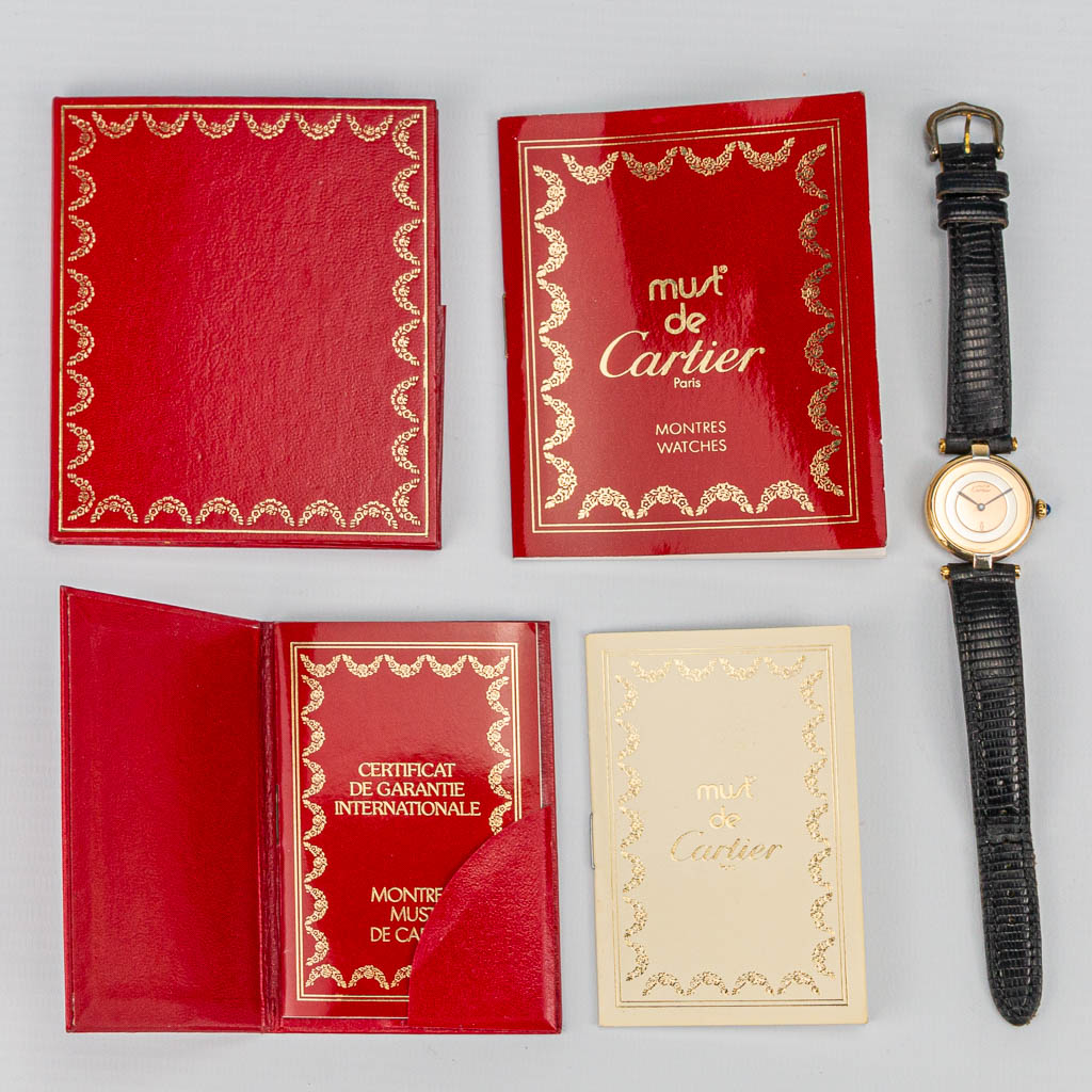 A 'Must De Cartier' wristwatch model Vendome with papers.
