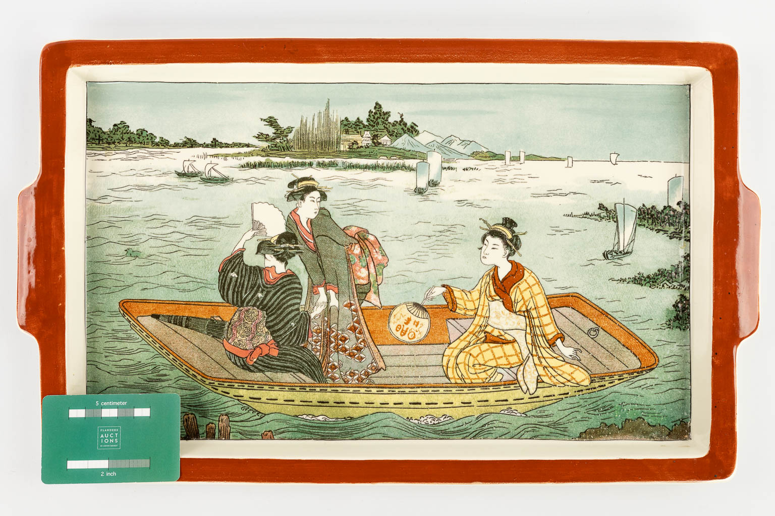 Sarreguemines, een dienbord met Japans decor, gedateerd December 1863. (D:28,5 x W:47 cm)