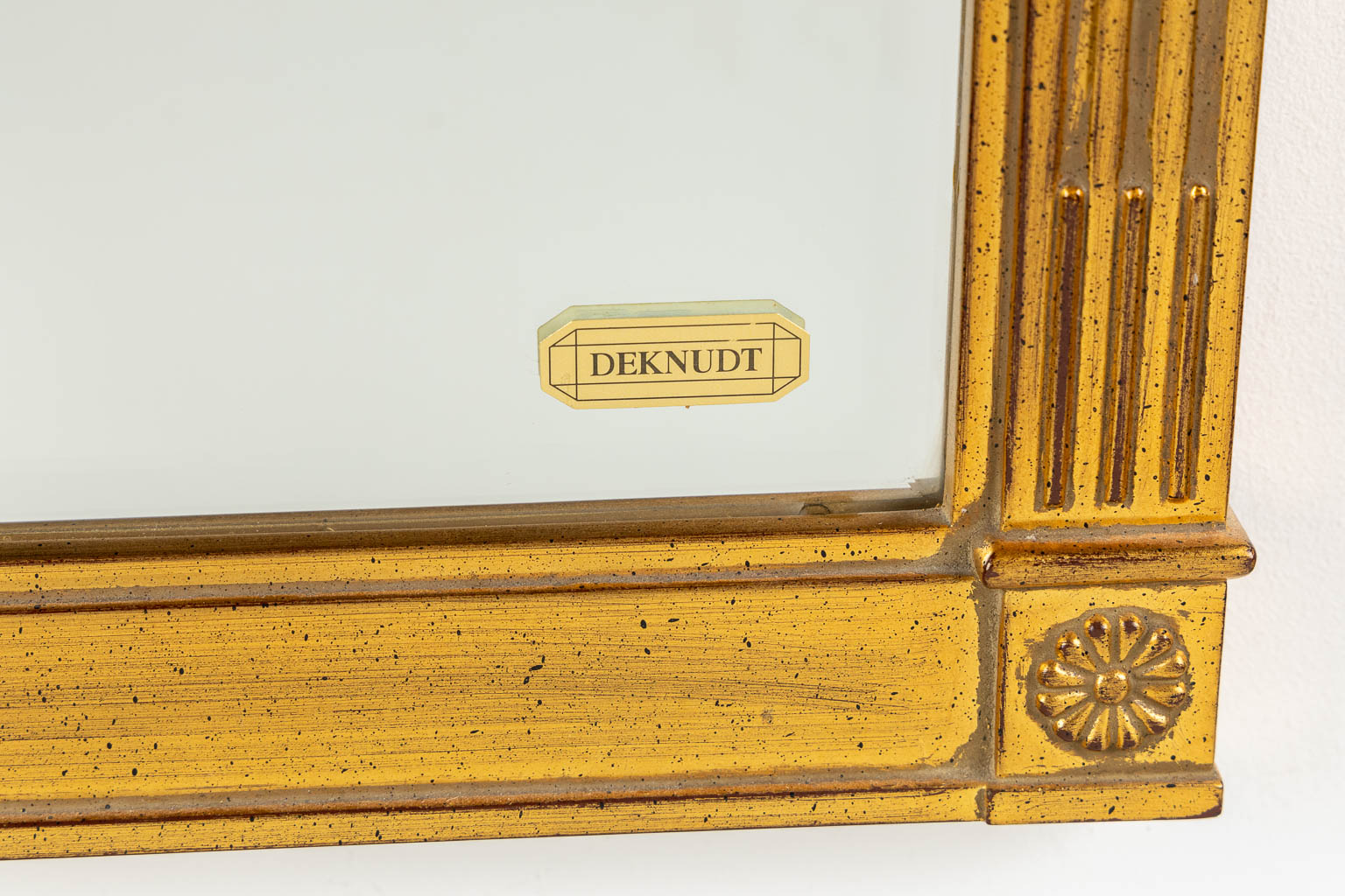Deknudt, a mirror, gilt wood in Empire style. (W:74 x H:102 cm)