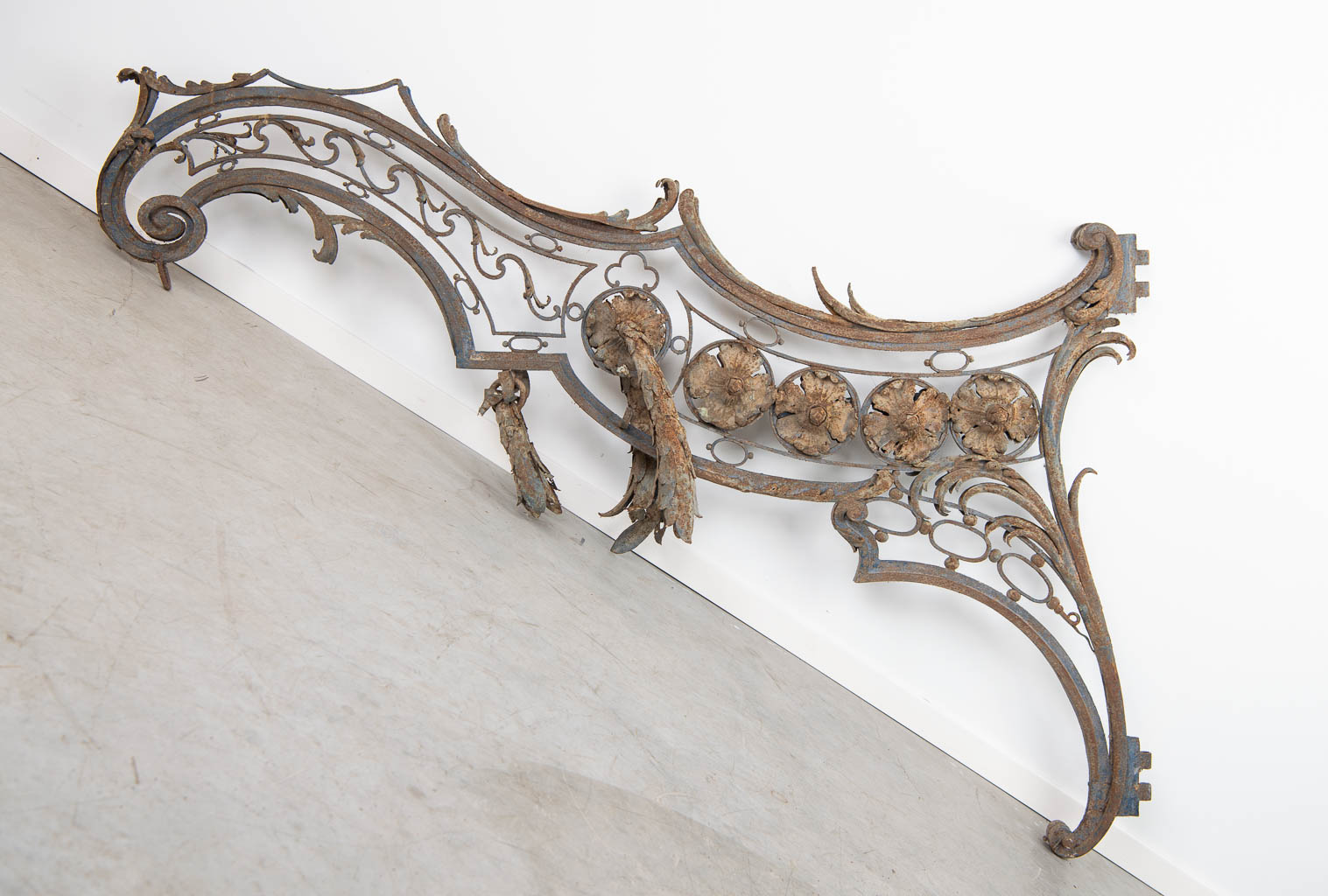 An antique standard for a road sign, made of wrought iron and richly decorated. (H:122cm)