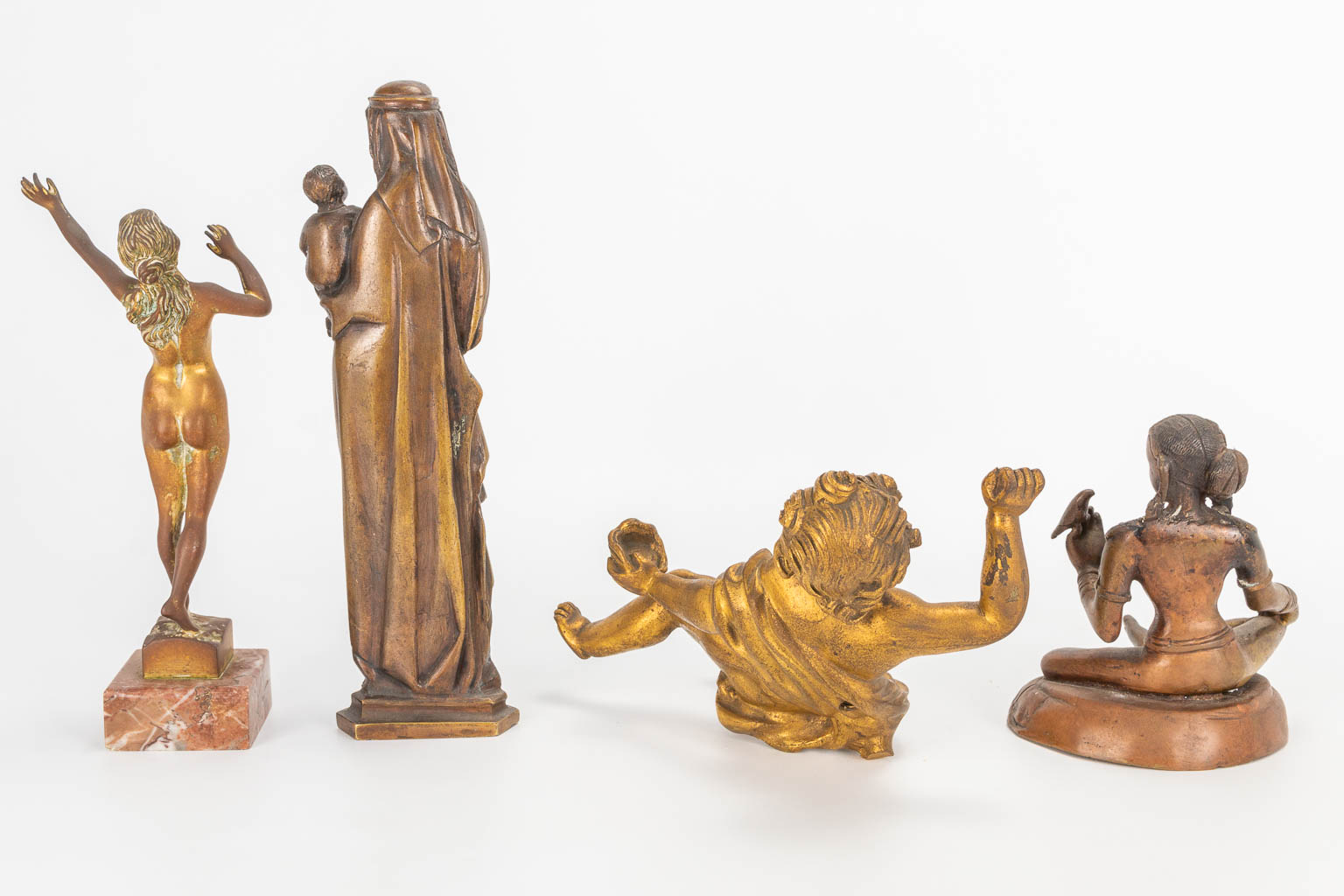 A collection of 10 bronze and spelter figurines and objects. (H:23cm)