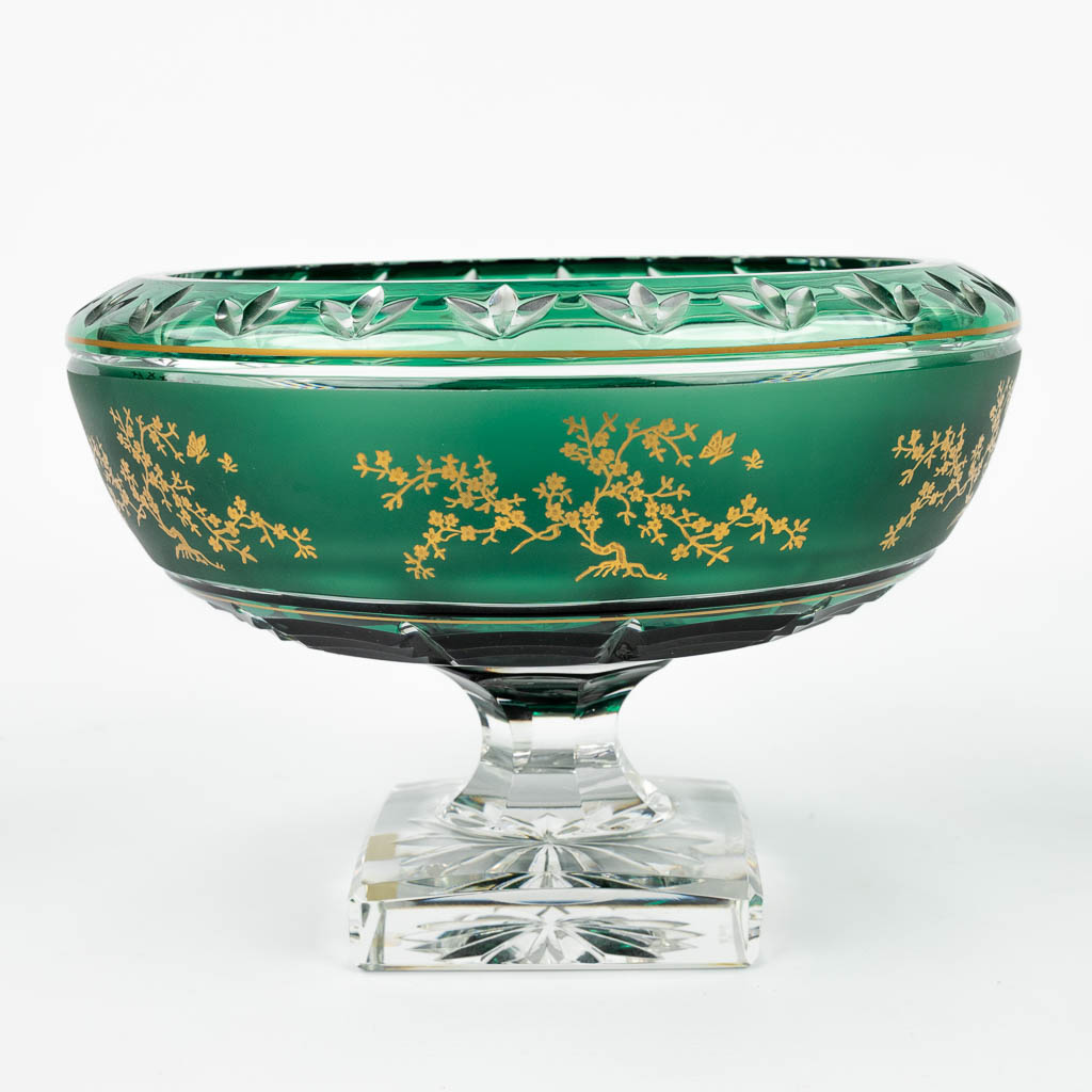 A bowl made of cut crystal and etched bonsai trees, marked 