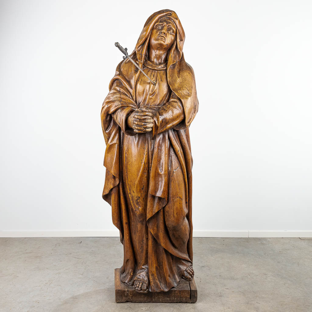 An exceptionally large statue 'Our Lady of Sorrows' with sword made of silver. 