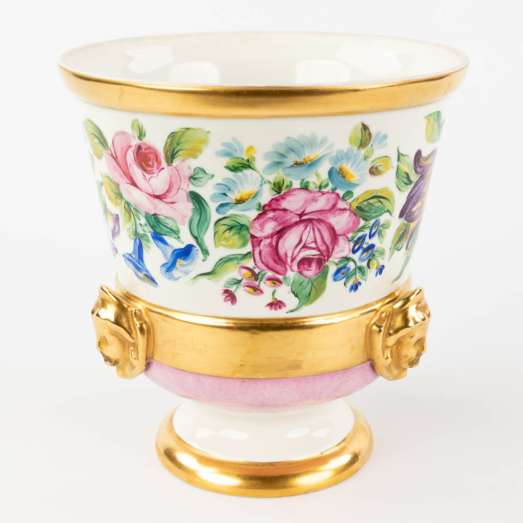  A large porcelain cache-pot with hand-painted flower decor. Atelier d'Art Faubourg St Honoré Paris.