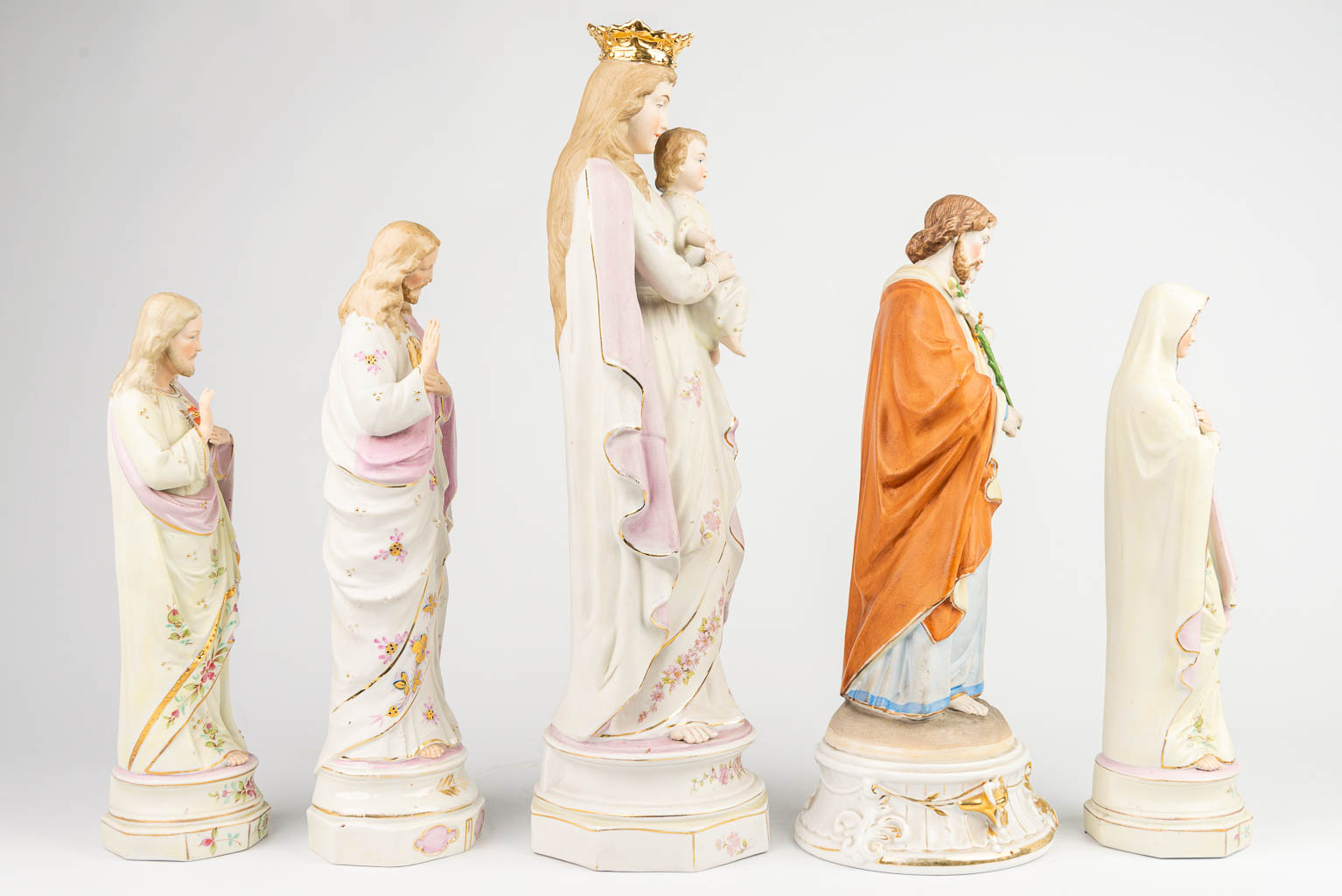 A collection of 6 pieces of polychrome bisque statues of holy figurines. (H:46cm)