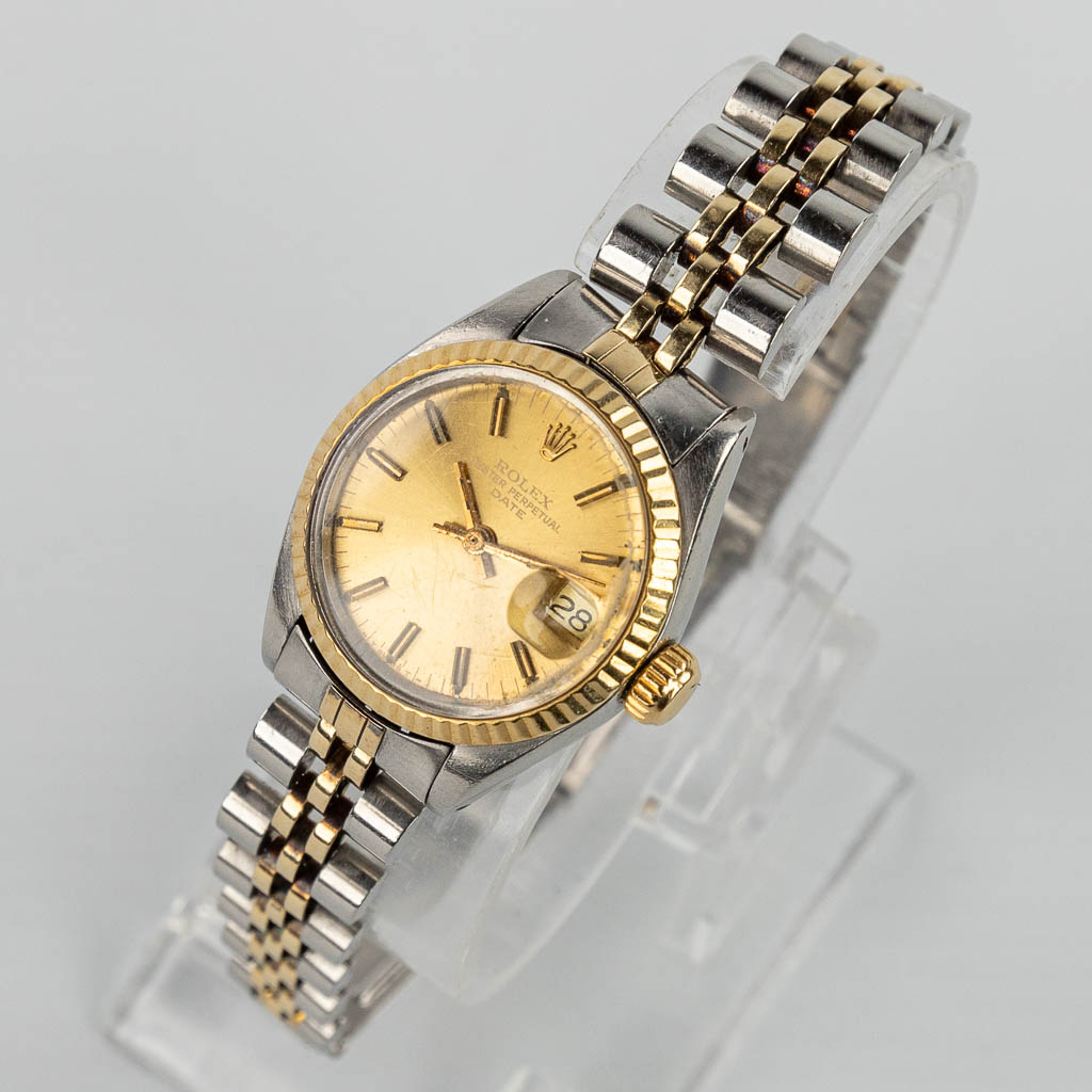 A Rolex Oyster Perpetual Date ladies model made of steel and 18 karats yellow gold. 