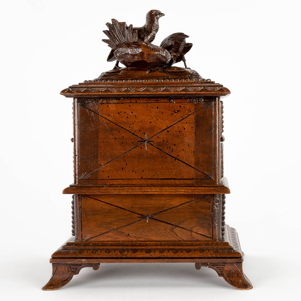 A jewelry box, sculptured wood, decor of birds and flowers, black forest. (D:16 x W:24 x H:32 cm)