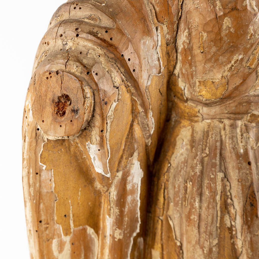 A wood-sculptured Madonna, remains of the original patina. 18th C. (D:15 x W:26 x H:62 cm)