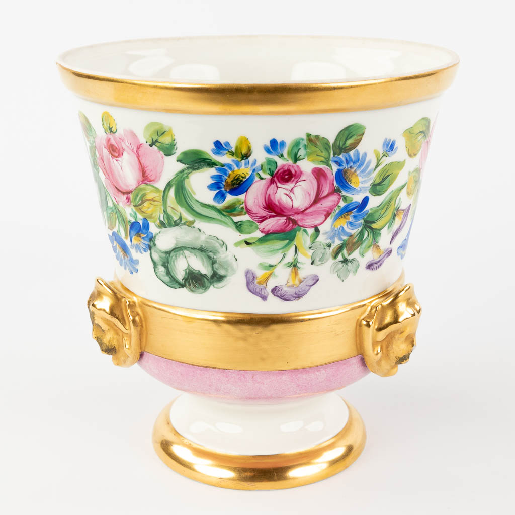 A large porcelain cache-pot with hand-painted flower decor. Atelier d