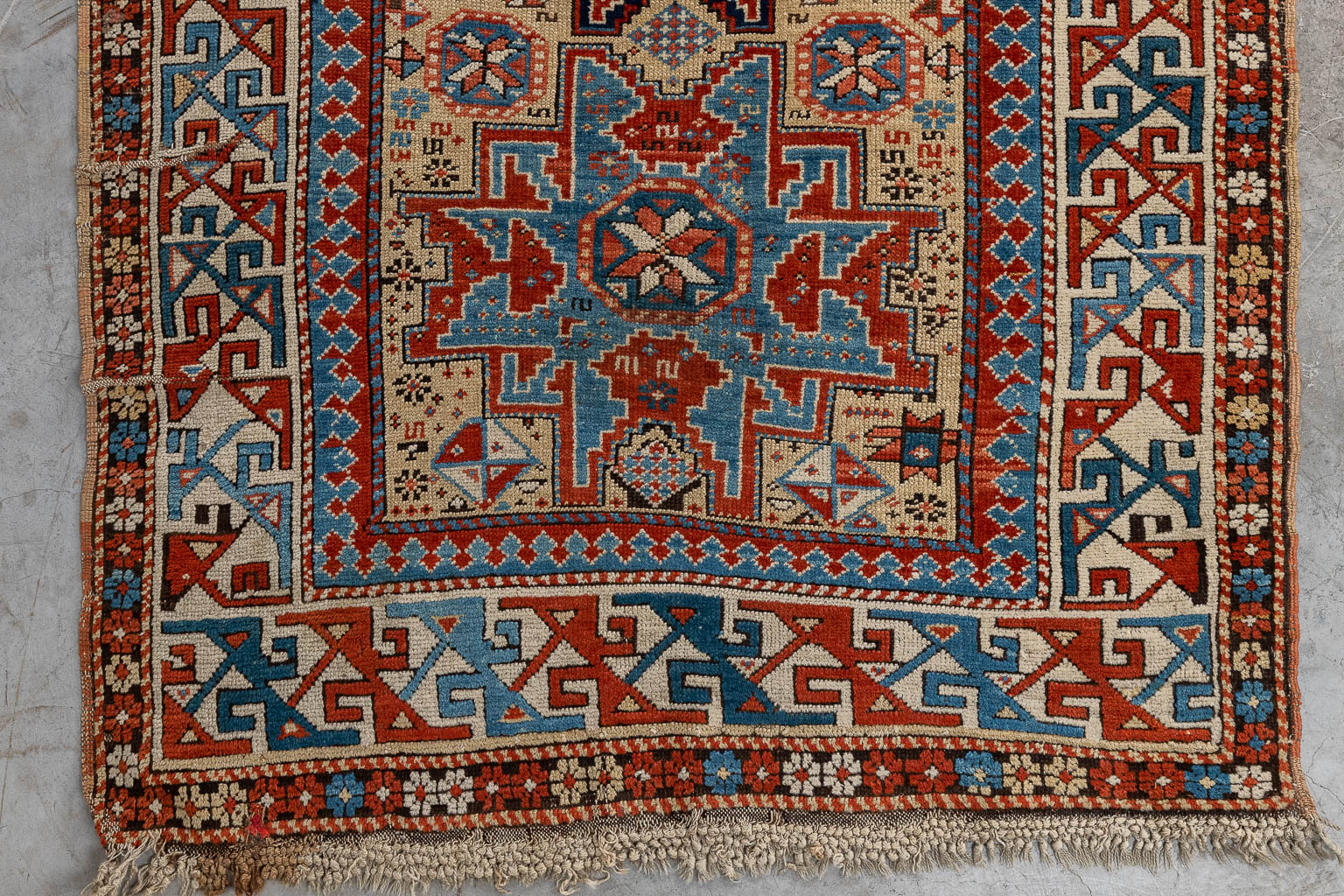 A collection of 2 Oriental hand-made carpets. Probably Caucasian. (L: 277 x W: 115 cm)