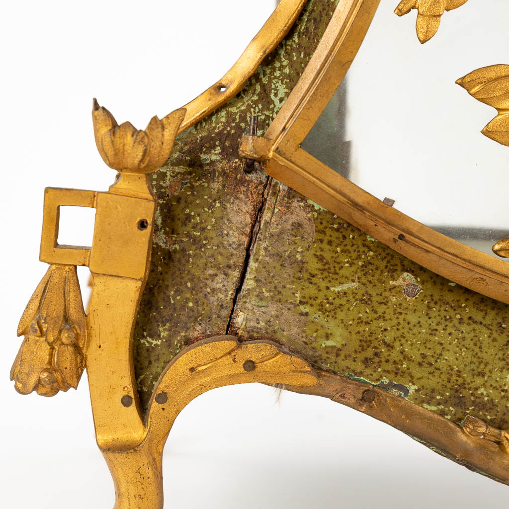 An antique cartel clock, wood mounted with gilt bronze, Louis XVI. (D:14 x W:36 x H:79 cm)