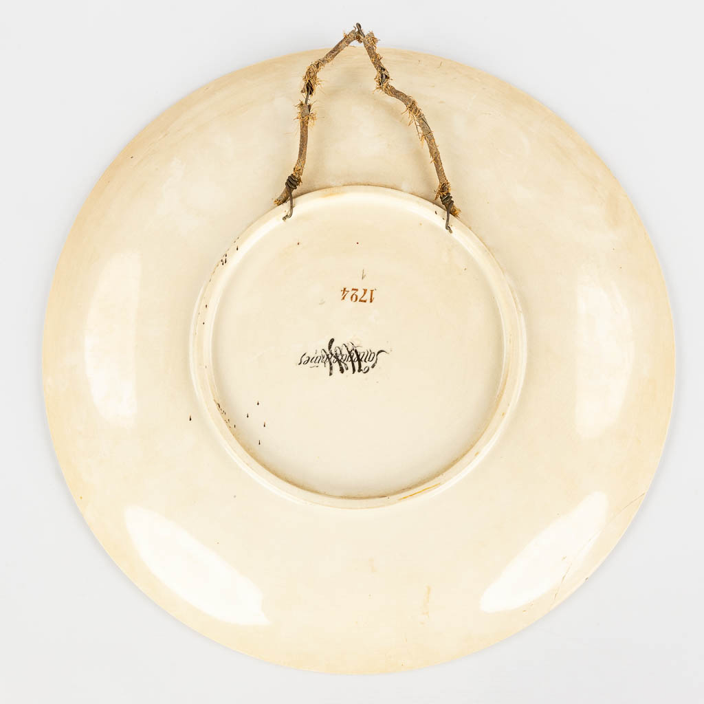 Sarreguemines, a large plate with romantic scène, hand-painted faience. (D:44 cm)