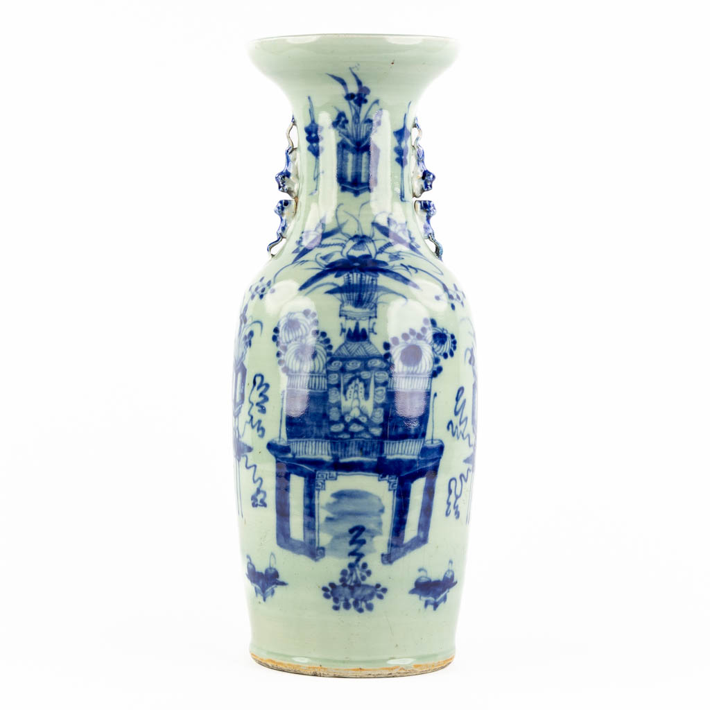 A Chinese celadon vase, decorated with flowers. 19th C. (H:56 x D:22 cm)