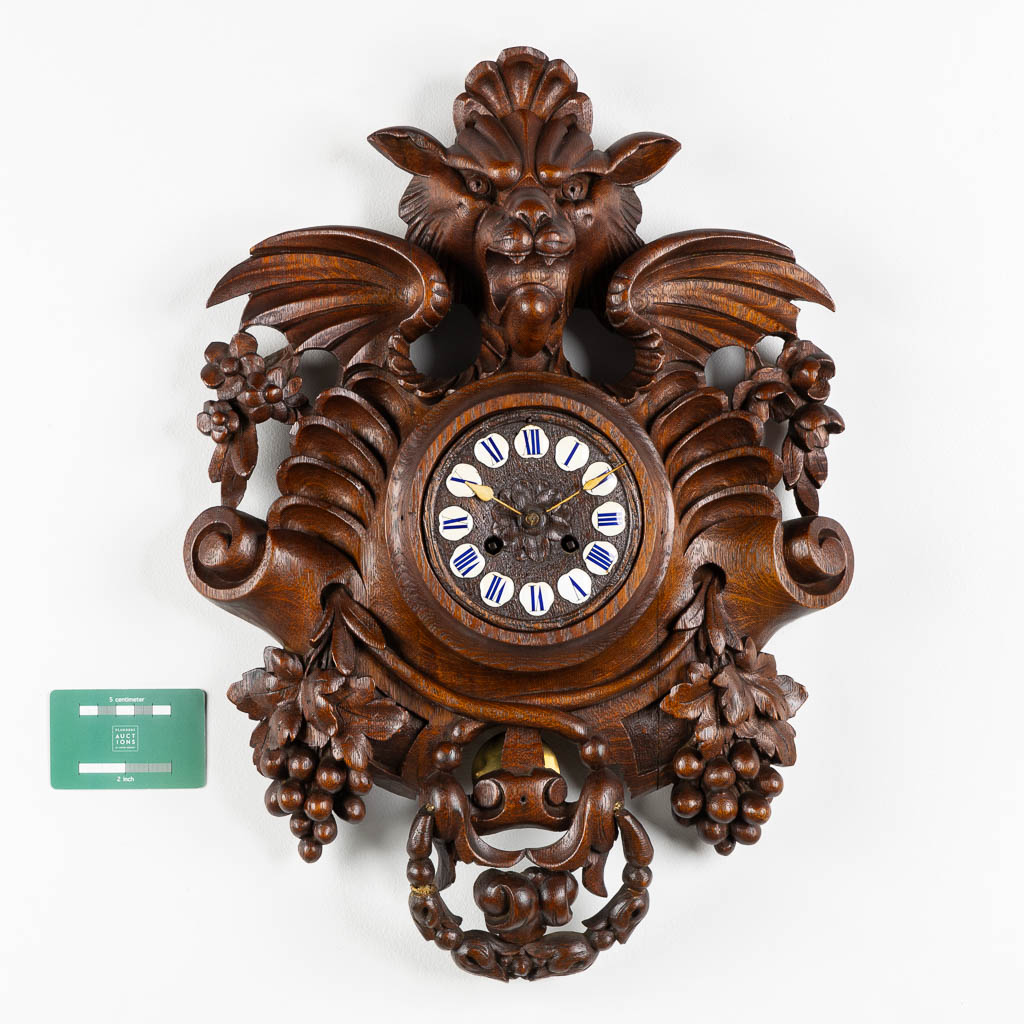 An antique Swiss or Black-Forest, wall-mounted clock. Circa 1880. (W:38 x H:53 cm)